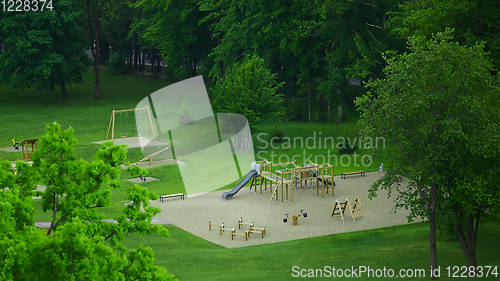 Image of Colorful playground on yard in the park.