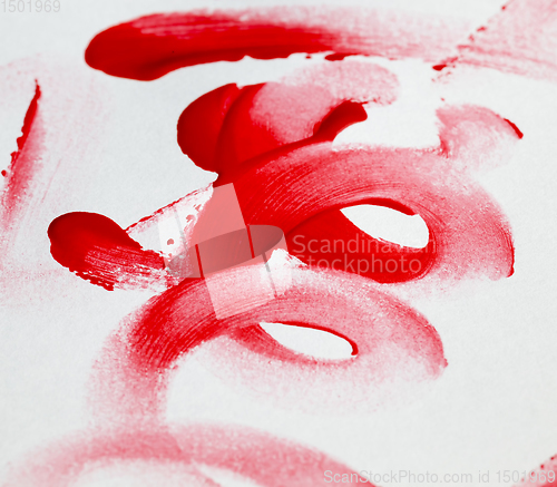 Image of spots of red paint