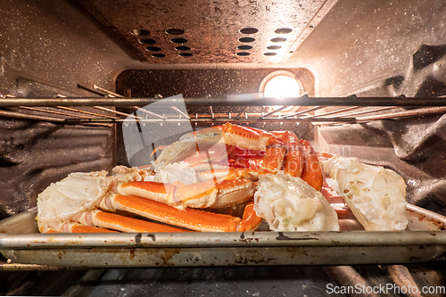 Image of fresh and delicious snow crab legs prepared in the oven