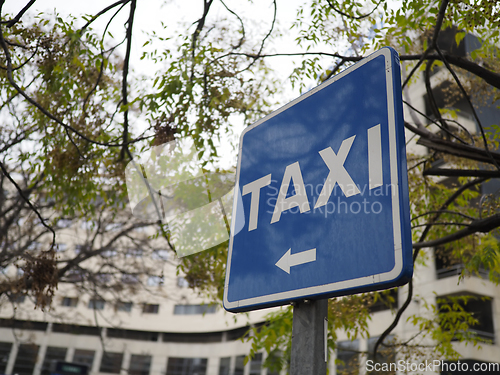 Image of Taxi sign on street