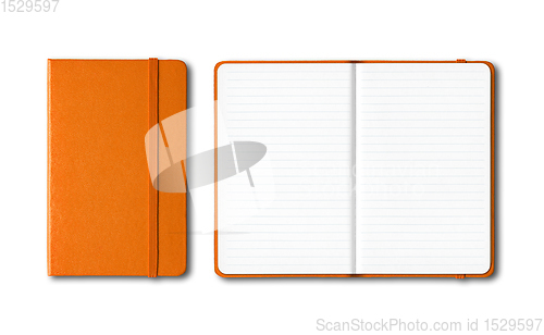 Image of Orange closed and open lined notebooks isolated on white