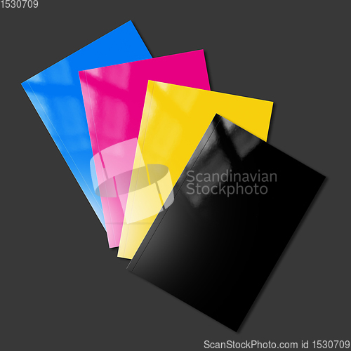Image of CMYK booklets set mockup on black background