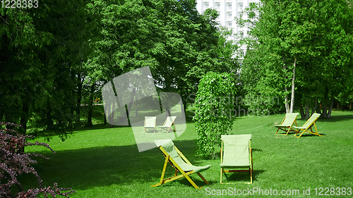 Image of Rest chairs in the garden. Resort concept