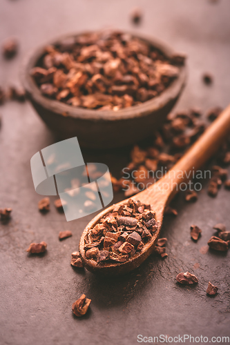 Image of Organic cacao nibs in small bowl 