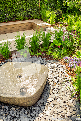 Image of Small water fountain with  cozy seating area for terrace, garden or patio