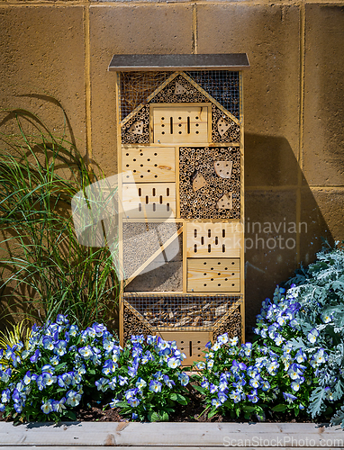 Image of Insect hotel made, bug house made from different materials to offer protection and nesting aid