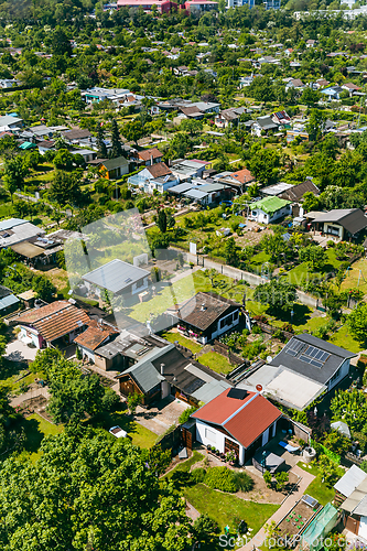 Image of Aerial view of a cluster of houses and gardens in Mannheim, Germany. Suburb and urbanization concept