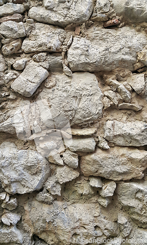 Image of Very old stone wall texture, architectural background