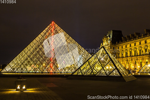 Image of The Louvre at night in Paris