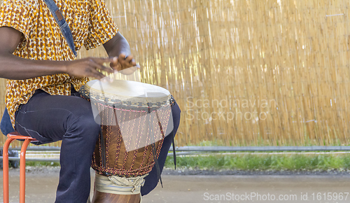 Image of african dlembe player