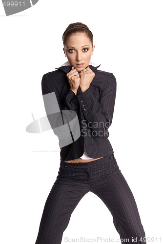 Image of brunett woman pin stripe suite