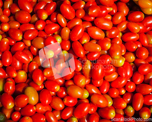 Image of Red small sweet tomatoes background