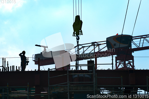 Image of Silhouette construction worker site man