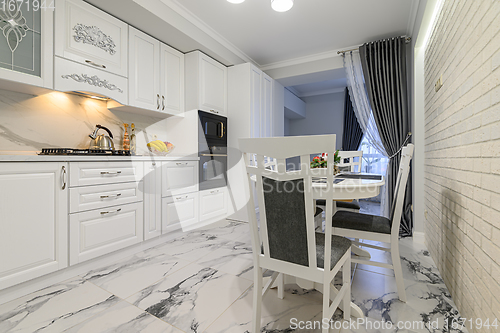 Image of White kitchen in classic style just before the Christmas