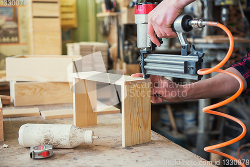 Image of Worker making the wood box