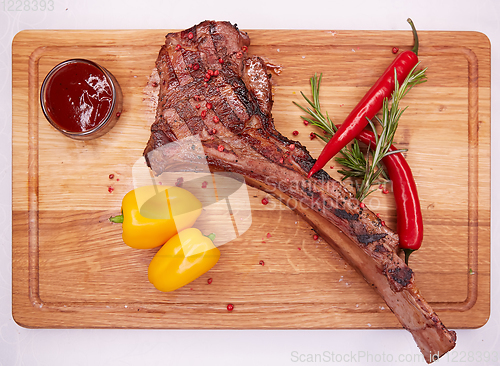 Image of The Barbecue Tomahawk Steak on Cutting Board