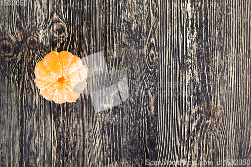 Image of peeled orange juicy tangerine