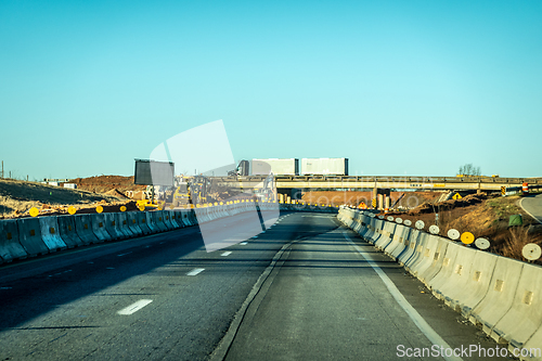 Image of abstract highway contruction while driving