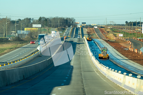 Image of abstract highway contruction while driving