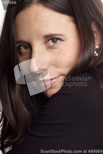 Image of dark-haired woman face