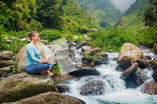 Image of Woman in Padmasana outdoors