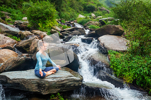 Image of Woman in Padmasana outdoors