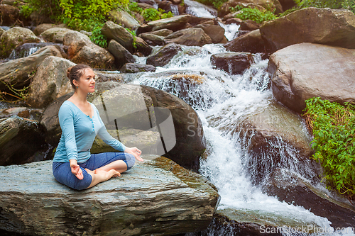 Image of Woman in Padmasana outdoors