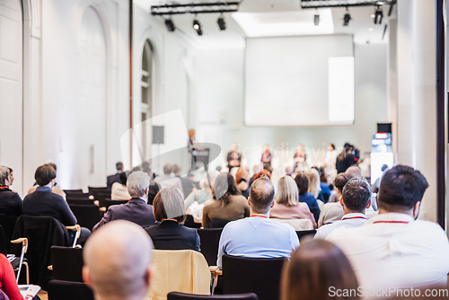 Image of Round table discussion at business conference meeting event.. Audience at the conference hall. Business and entrepreneurship symposium.