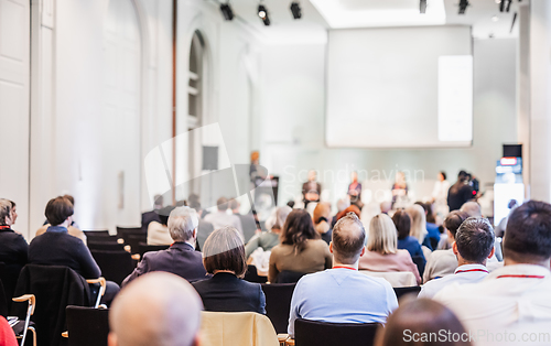 Image of Round table discussion at business conference meeting event.. Audience at the conference hall. Business and entrepreneurship symposium.