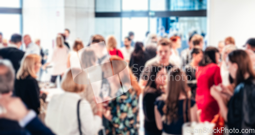 Image of Blured image of businesspeople at coffee break at conference meeting.