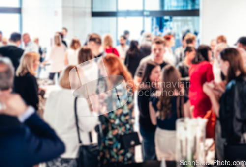 Image of Blured image of businesspeople at coffee break at conference meeting.