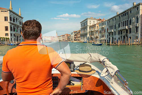 Image of Boats in venetian canal