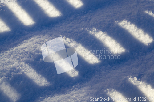 Image of striped shadows on a Sunny day