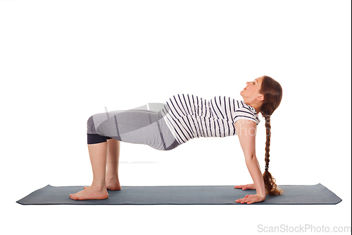 Image of Pregnant woman doing yoga asana Purvottanasana