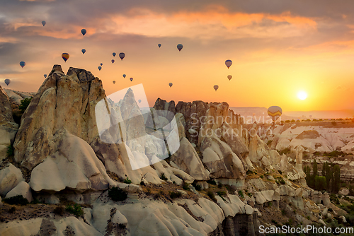 Image of Air balloons over rocks