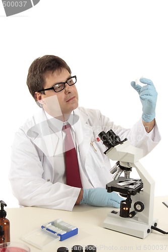 Image of Scientist inspecting a slide