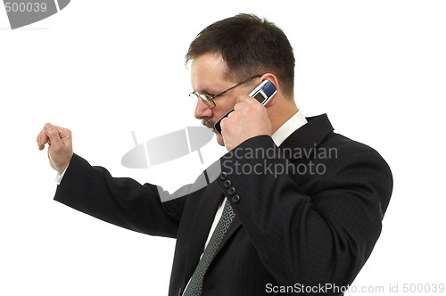 Image of  Businessmanit speaks by mobile phone