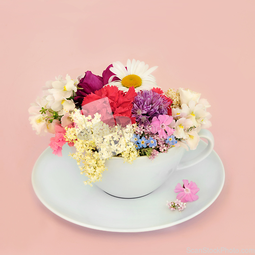 Image of Surreal Summer Flower and Wildflower Teacup Composition