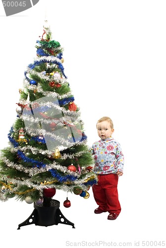 Image of Baby and christmas tree