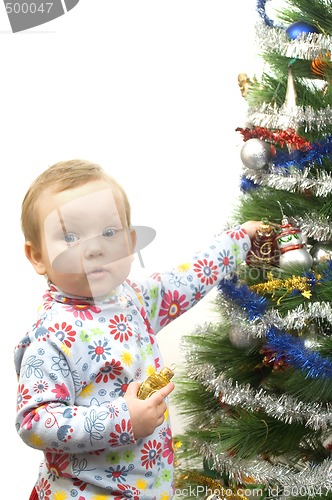 Image of Baby and christmas tree