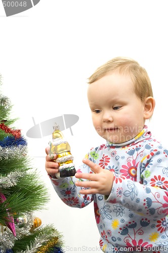 Image of Baby and christmas tree