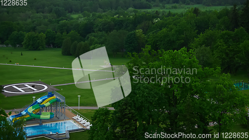 Image of swimming pool on luxury resort in forest.