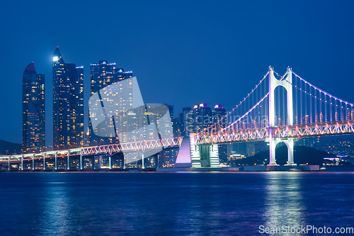 Image of Gwangan Bridge and skyscrapers in the night. Busan, South Korea