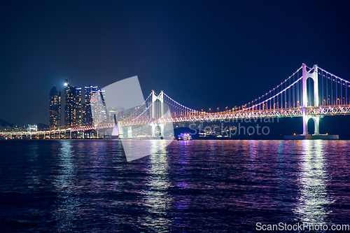 Image of Gwangan Bridge and skyscrapers in the night. Busan, South Korea