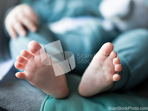 Image of Close-up of cute little baby feet, innocence concept.