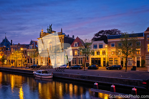 Image of Canal and houses in the evening. Haarlem, Netherlands