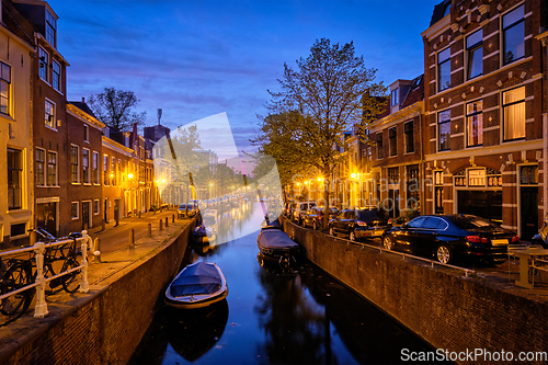 Image of Canal and houses in the evening. Haarlem, Netherlands