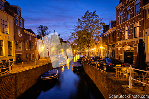 Image of Canal and houses in the evening. Haarlem, Netherlands