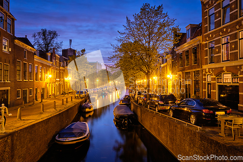 Image of Canal and houses in the evening. Haarlem, Netherlands