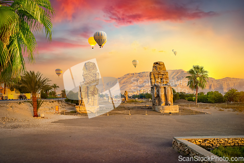 Image of Colossi of Memnon and balloons